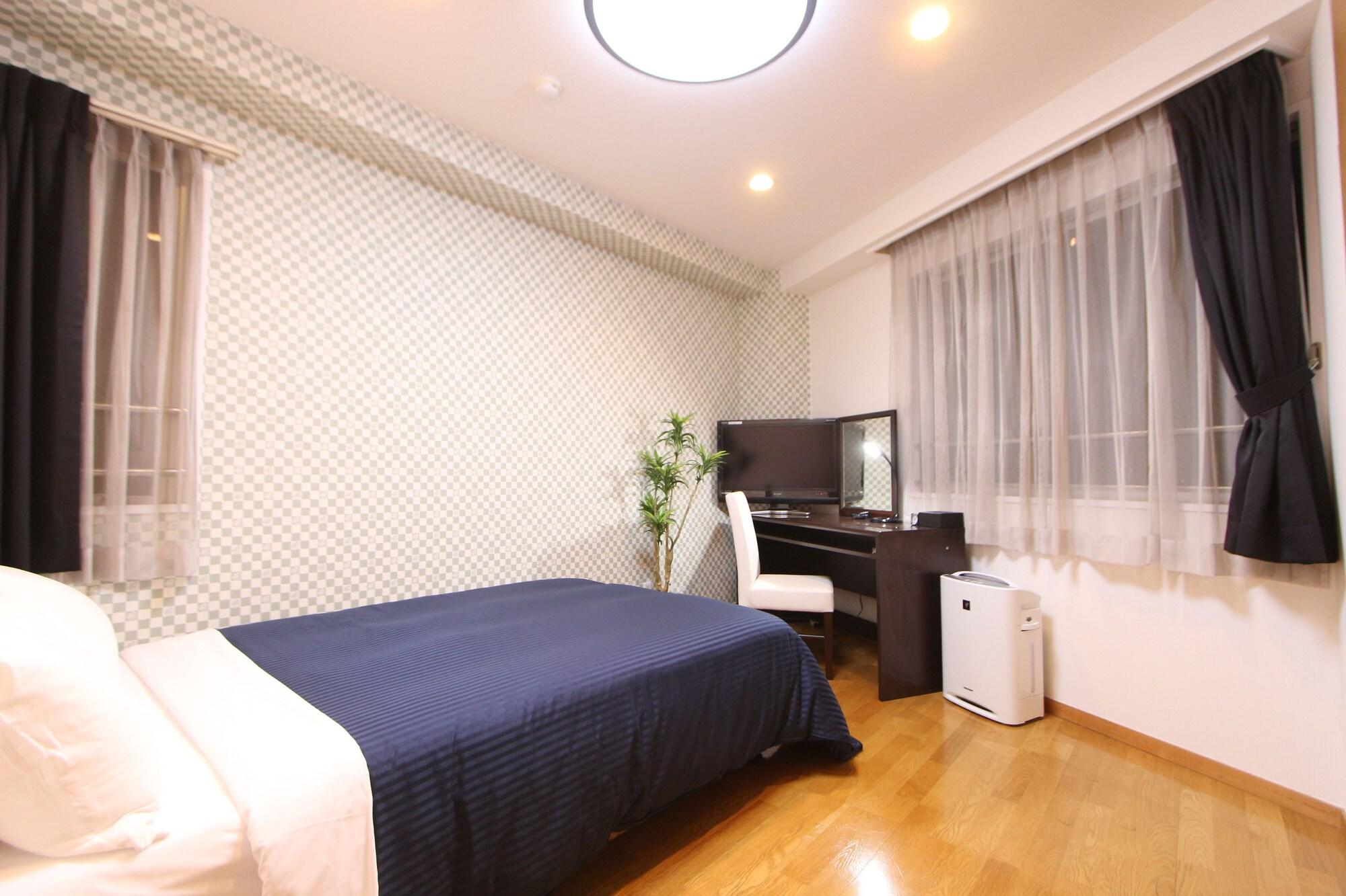 Livemax Budget Korakuen Hotel