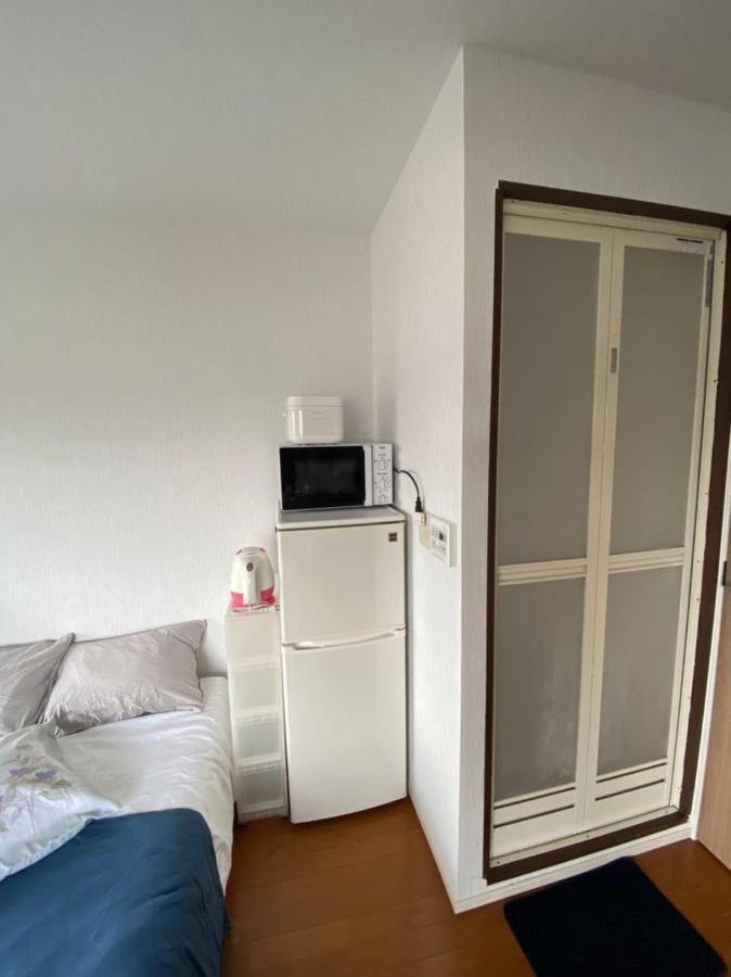 Takemura Building 305 *
