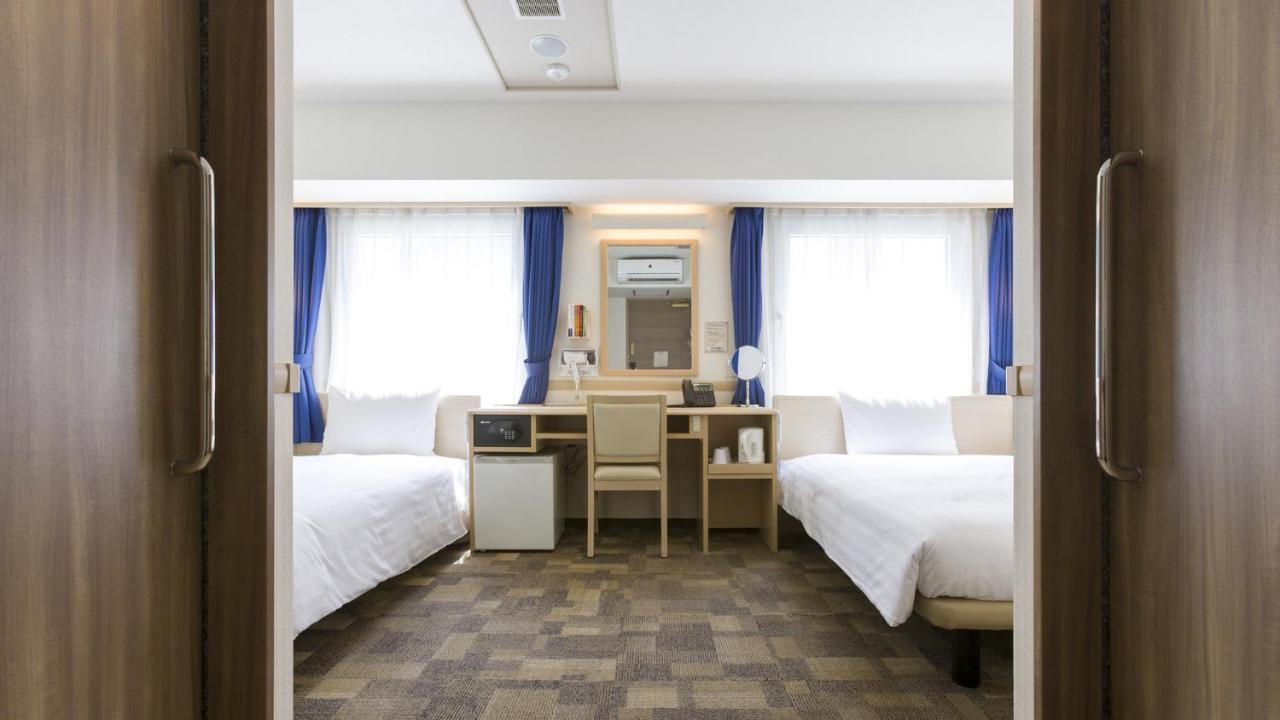 Toyoko Keihin Tohoku Sen Oji Eki Kita Guchi Hotel 3*