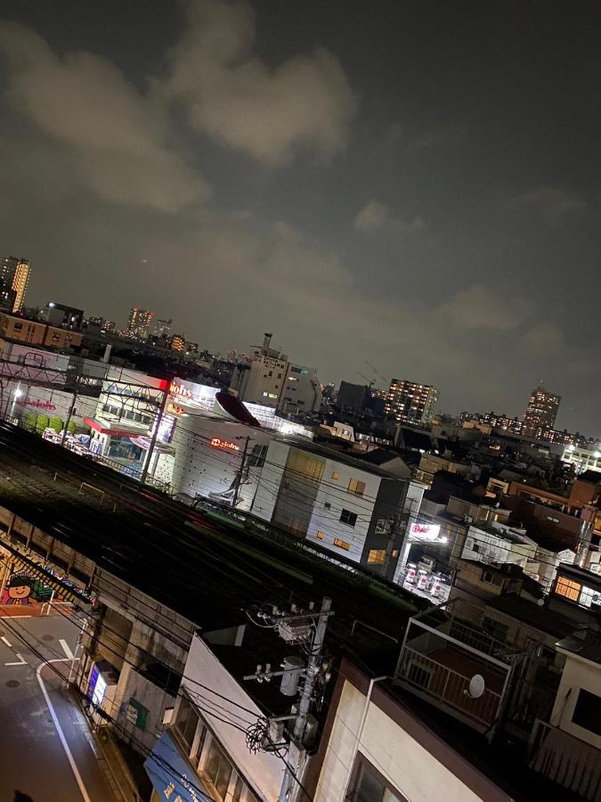 台東区寝室4つと広々吹き抜けリビングのメゾネットタイプのお家 *