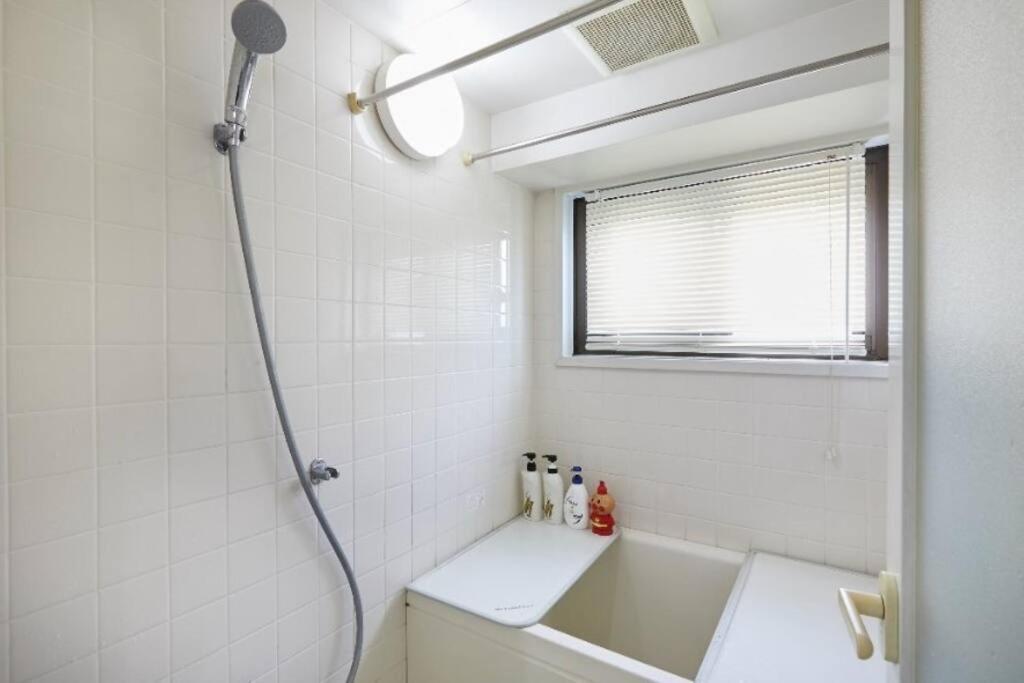 6楼整租公寓：机场附近的都市舒适住宿 Apartment