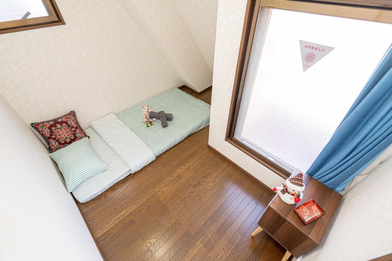 台東区寝室4つと広々吹き抜けリビングのメゾネットタイプのお家 Apartment