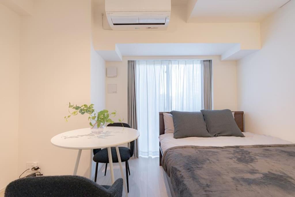 Unito Higashishinjuku Apartment