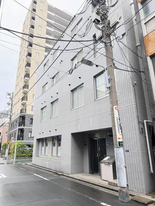 元桜上野浅草高級民泊最大8人駅6分高級ブランドベッド家庭映画館無料自転車 Apartment Tokyo