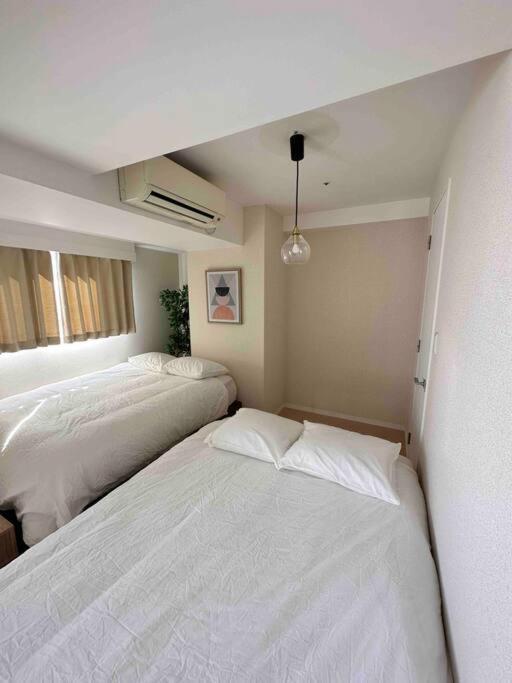 Apartment Kinshicho Sky View: Prime Location With Projector & Wi-fi