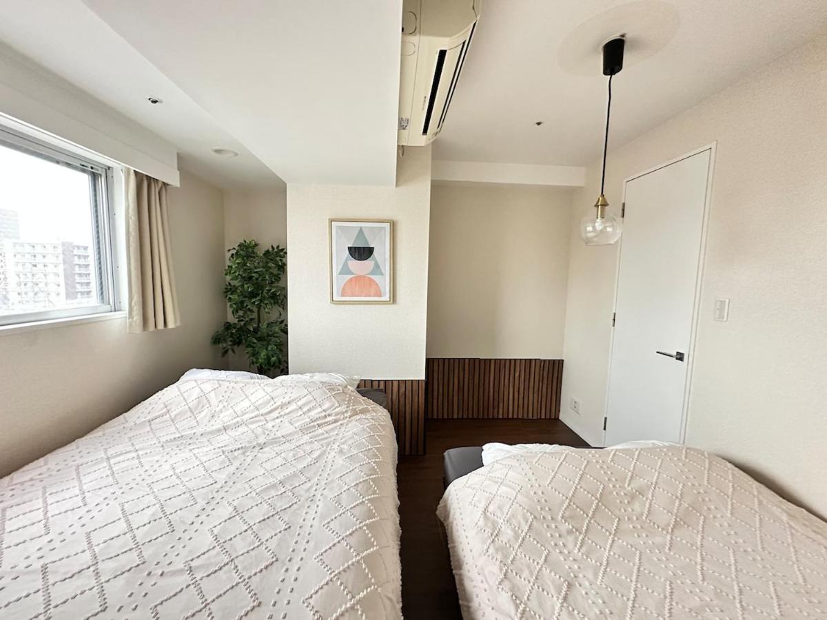 Apartment Kinshicho Sky View: Prime Location With Projector & Wi-fi Tokyo