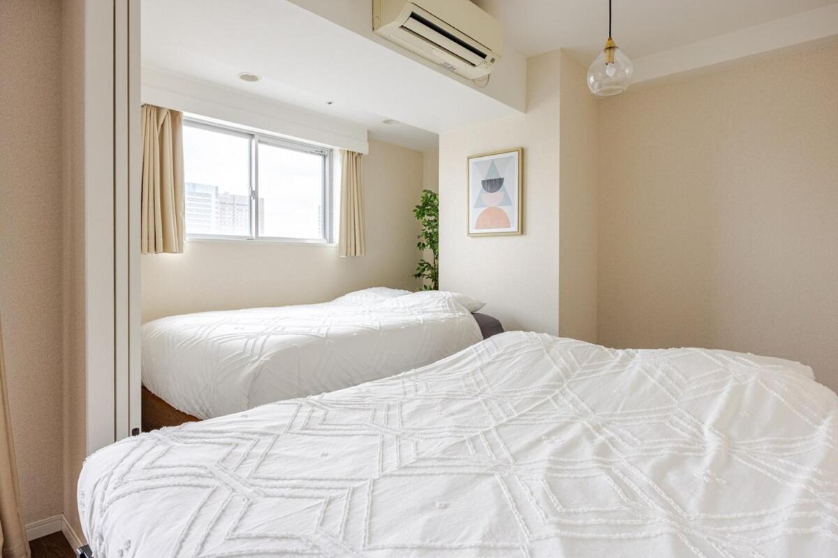 Apartment Kinshicho Sky View: Prime Location With Projector & Wi-fi Tokyo