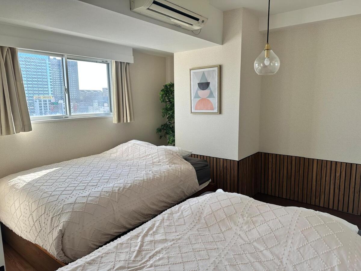 Apartment Kinshicho Sky View: Prime Location With Projector & Wi-fi